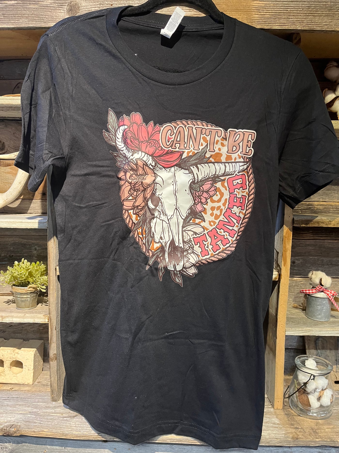 CAN'T BE TAMED TEE
