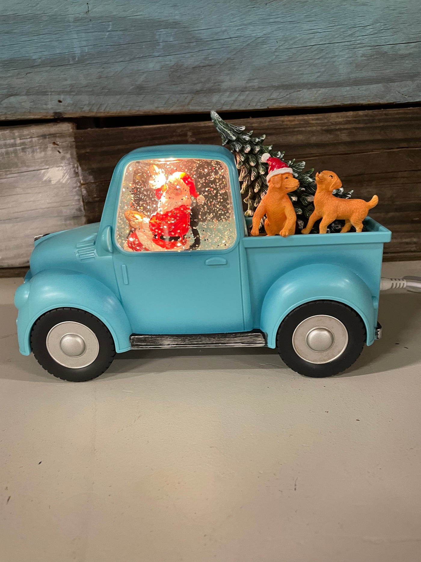 Santa in a truck Snow Globe