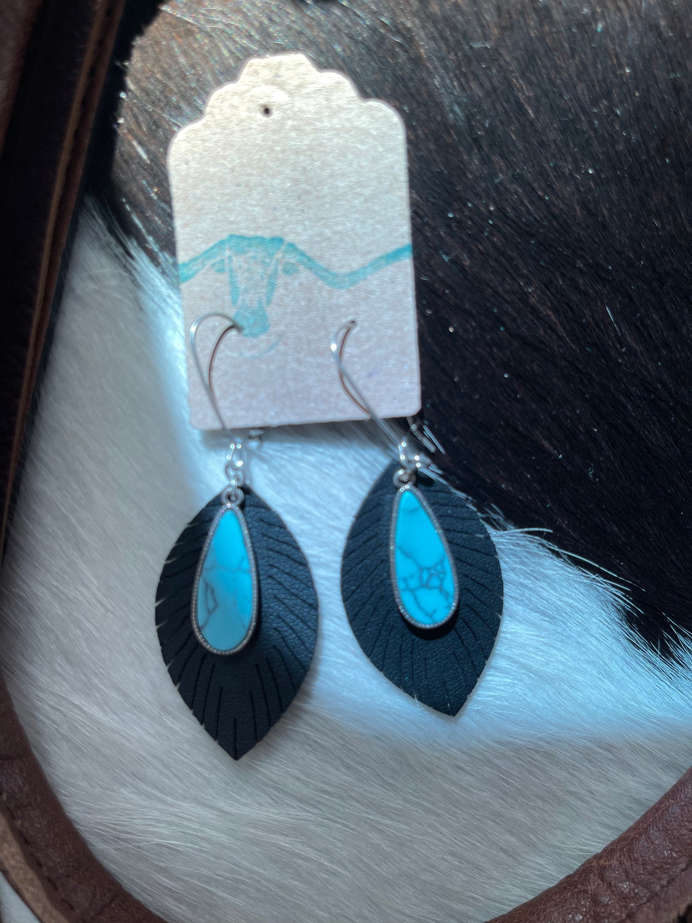 black feather leather earring w/ turquoise tear drop