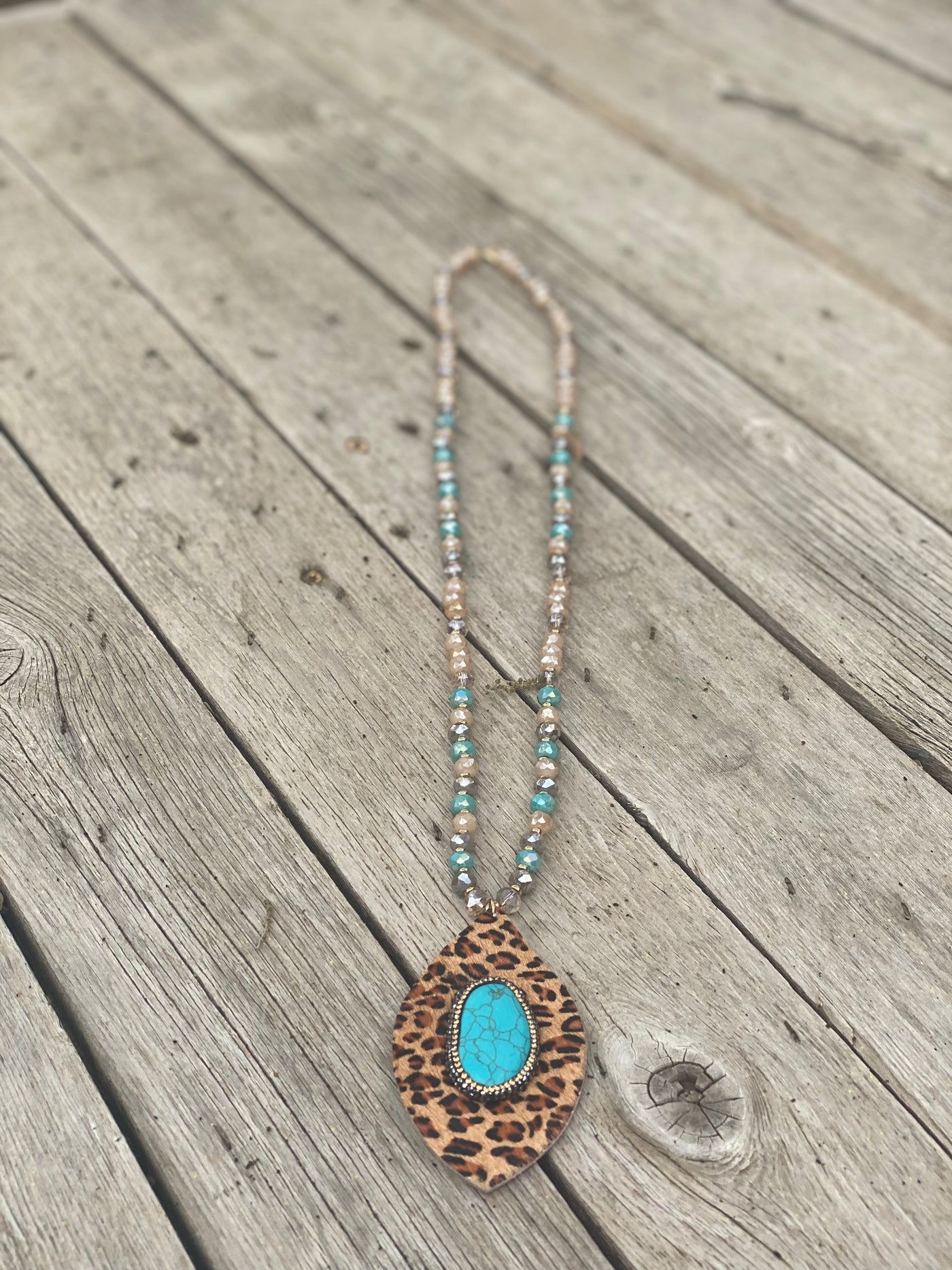 Long Beaded Necklace With Large Pendant