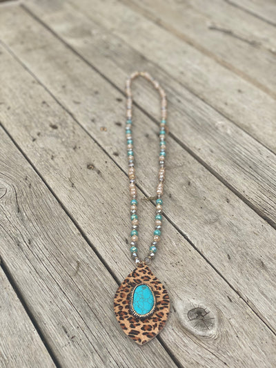 Long Beaded Necklace With Large Pendant